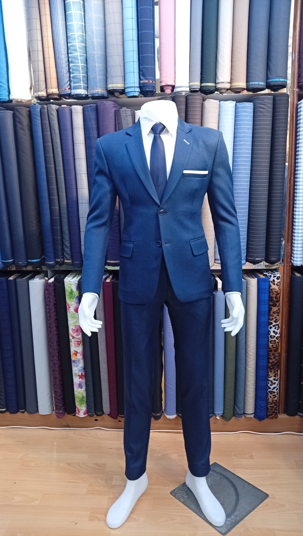 Curated rack of bespoke suits