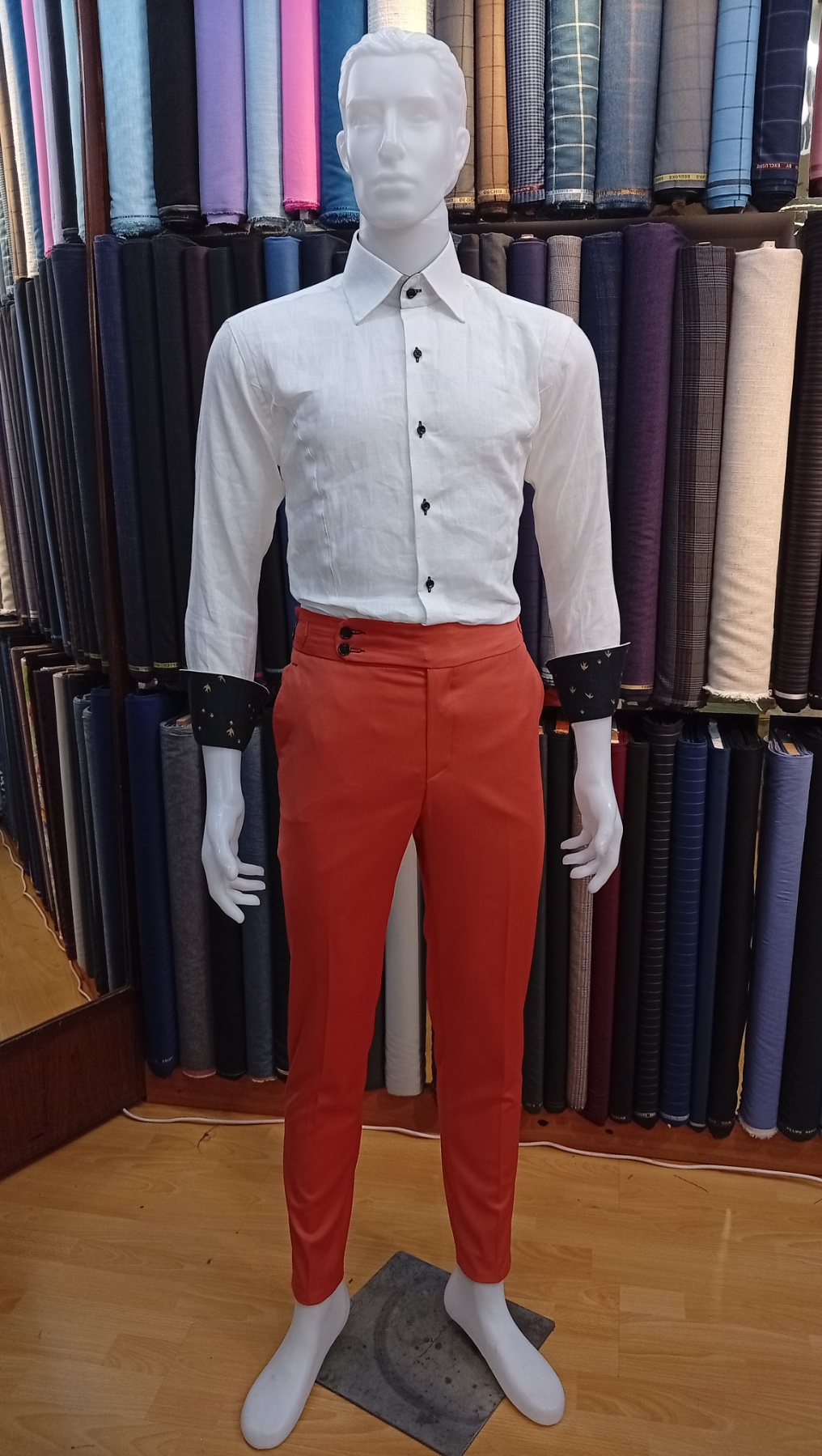 Evening wear duo in shop mirror