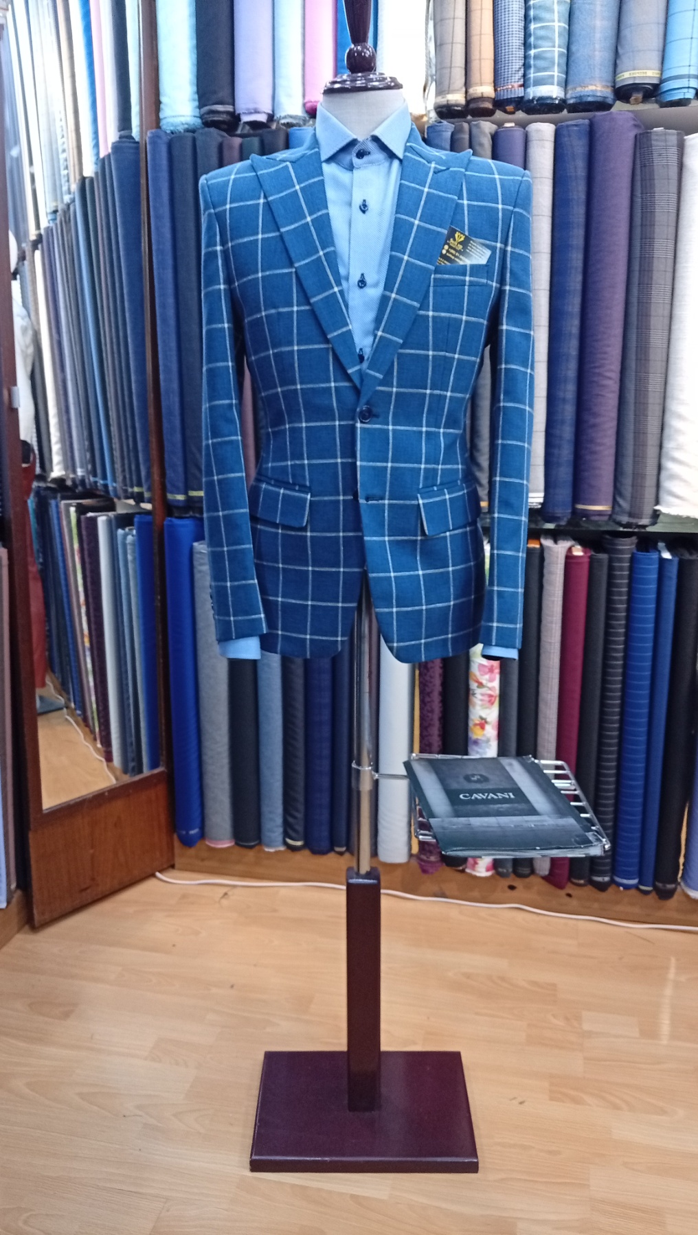 Soft grey suit pairing on mannequins