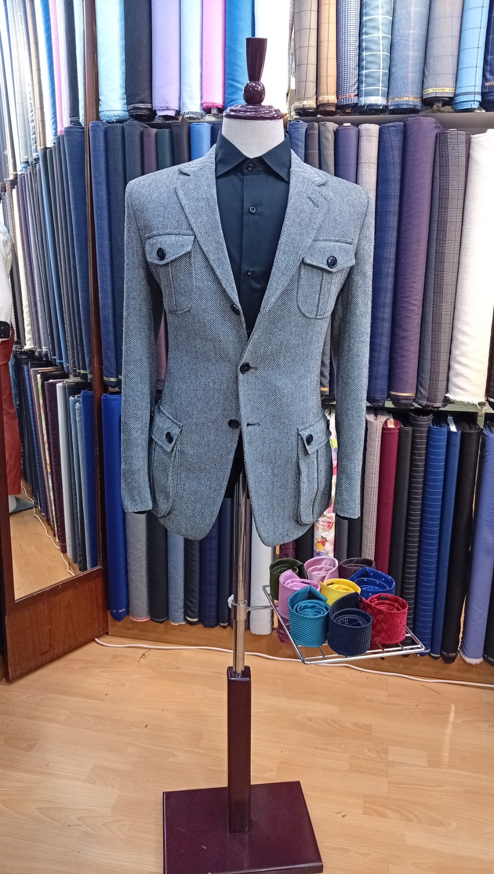 Double-breasted suit with brass buttons