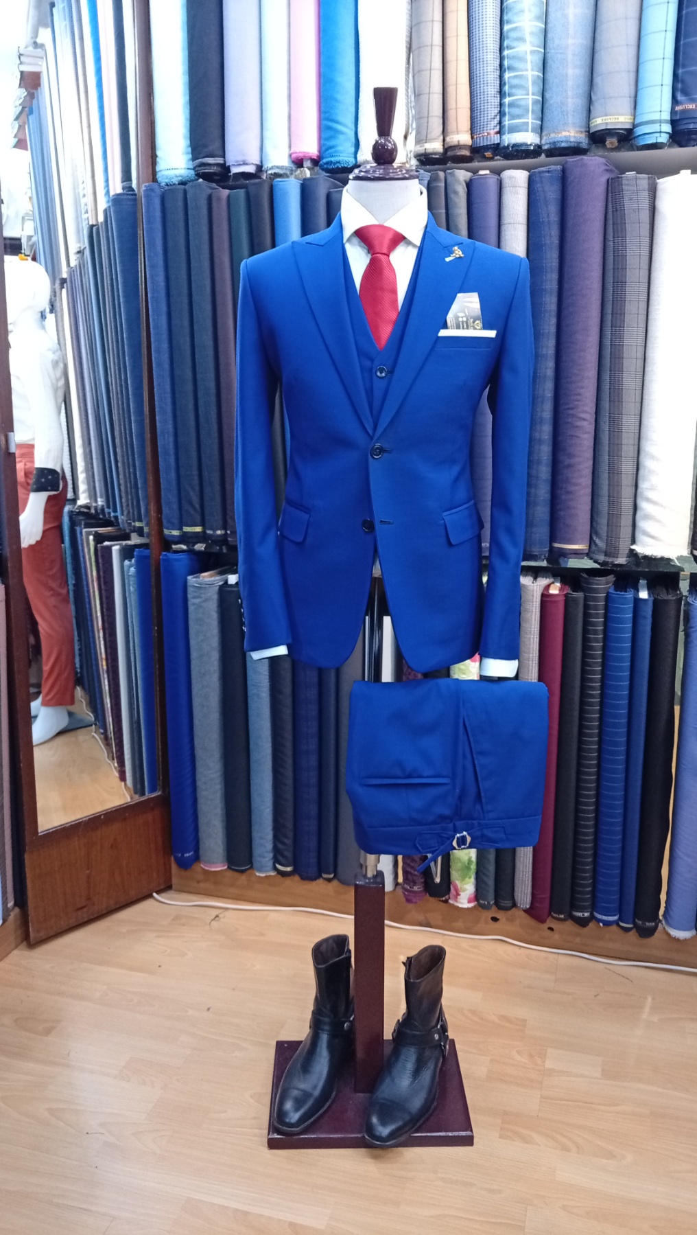 Window display with pastel suits