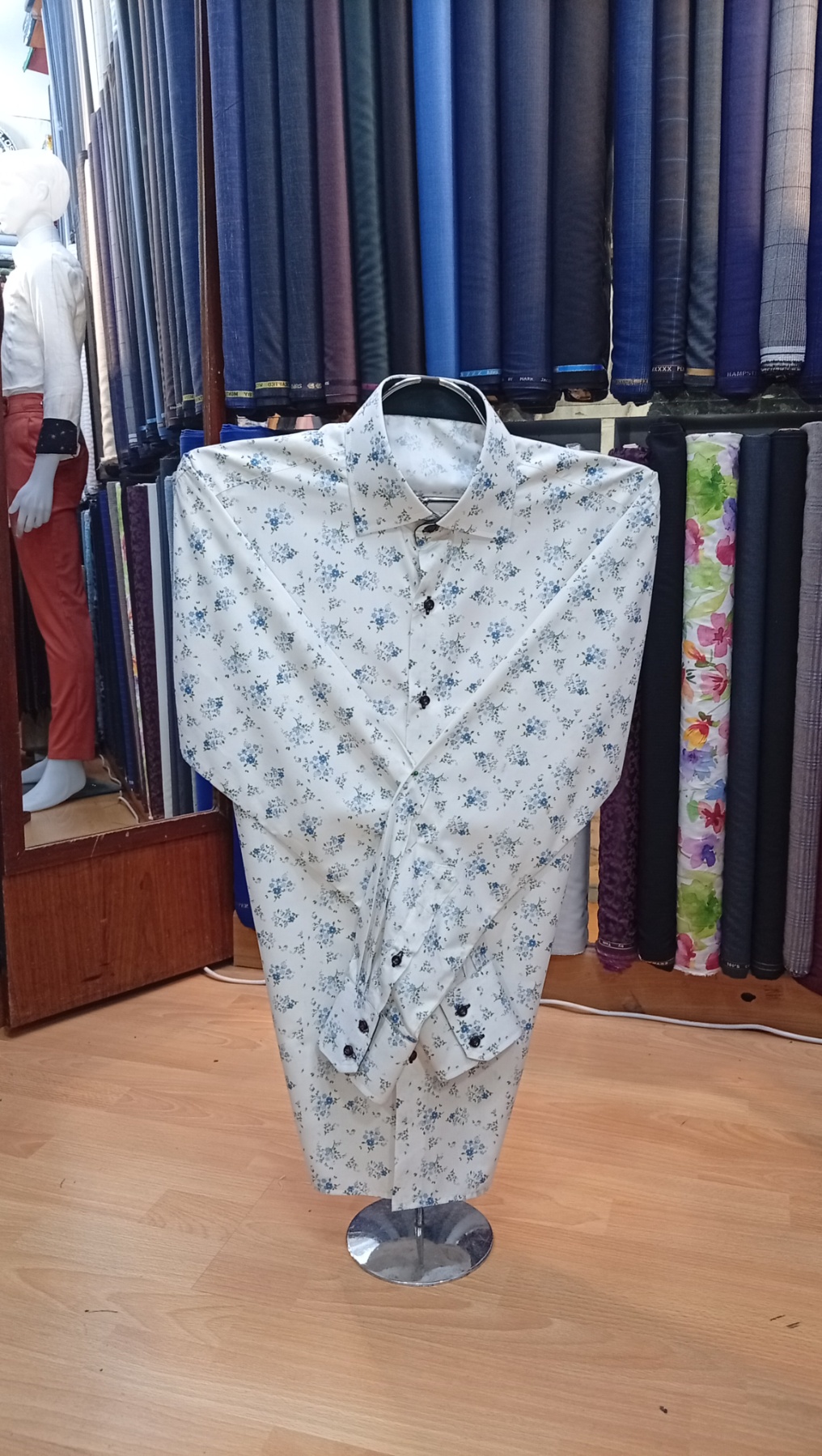 Tailored suit with accessories laid out