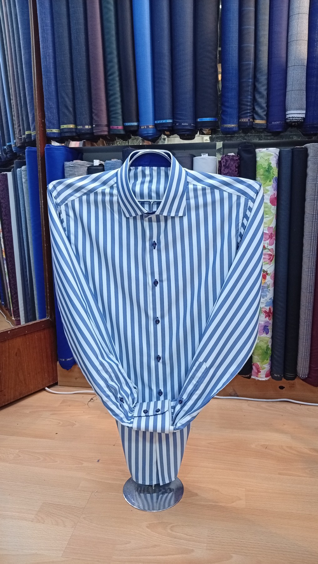 Pastel suits lined up in-store